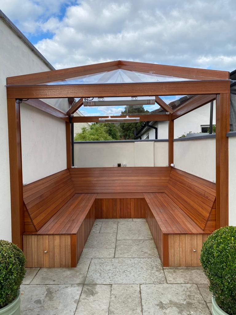 Apex wooden pergola with clear solid polycarbonate roof
